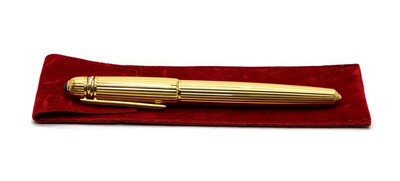 Lot 20 - A Cartier 'Pasha de Cartier' gold plated fountain pen