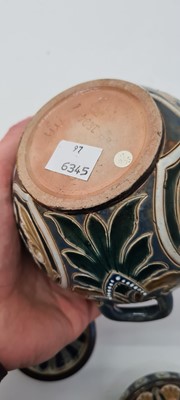 Lot 20 - A pair of Doulton Lambeth tobacco jars, lids and covers