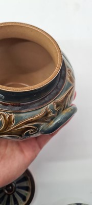 Lot 20 - A pair of Doulton Lambeth tobacco jars, lids and covers