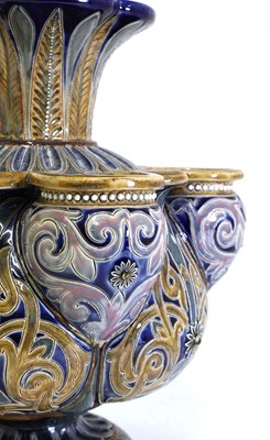 Lot 88 - A Doulton Lambeth stoneware crocus vase