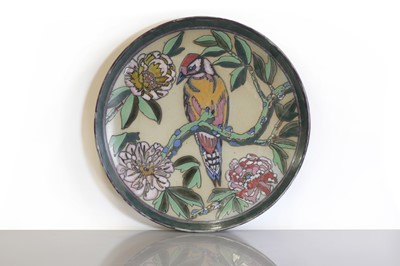 Lot 101 - A Doulton Lambeth stoneware charger