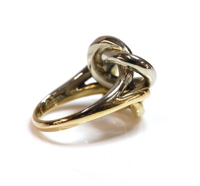 Lot 209 - An 18ct yellow and white gold fishermen's knot ring