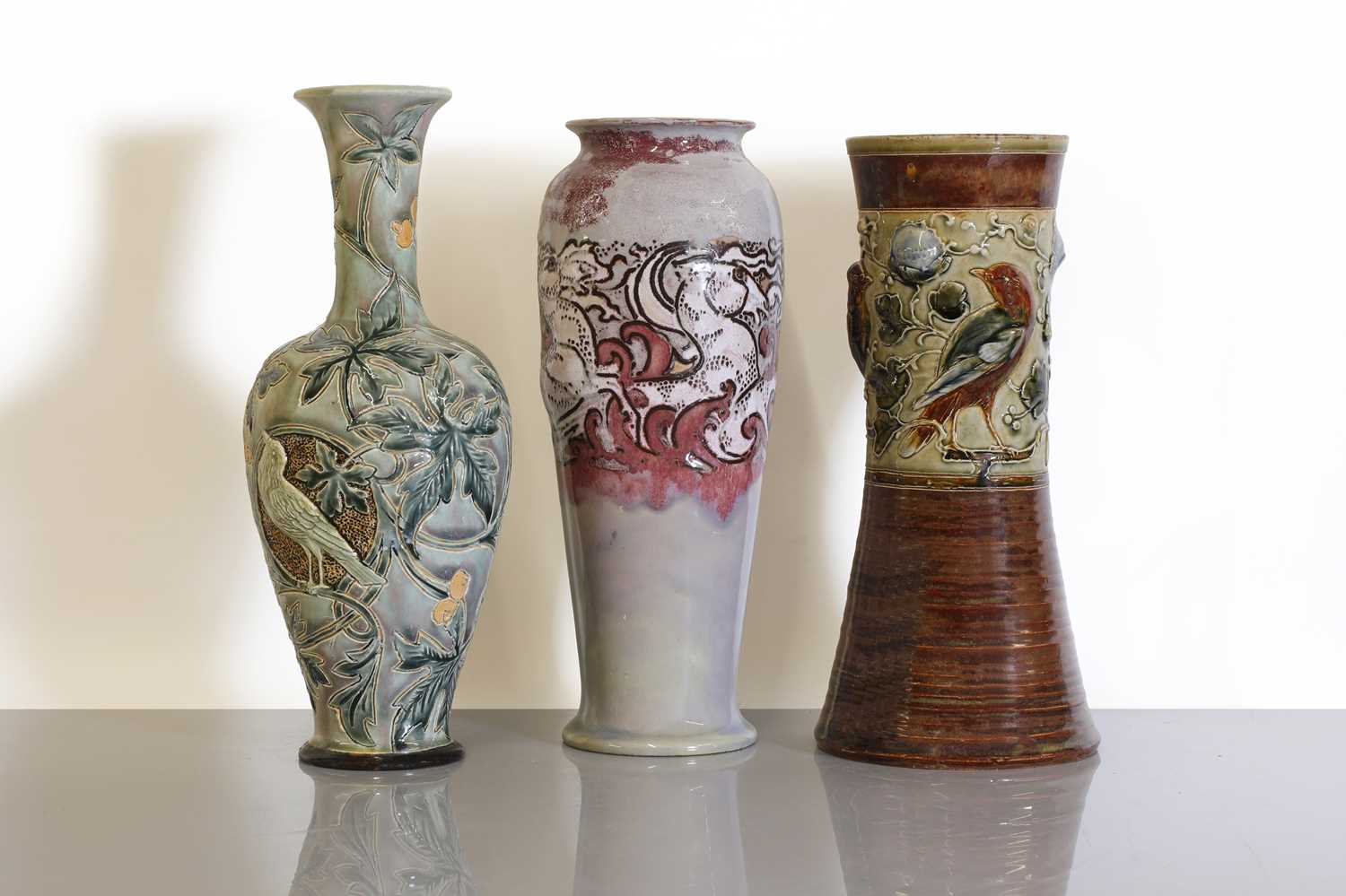 Lot 26 - Three Doulton Lambeth and Royal Doulton stoneware vases