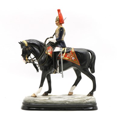 Lot 109A - A Michael Sutty porcelain figure on horseback
