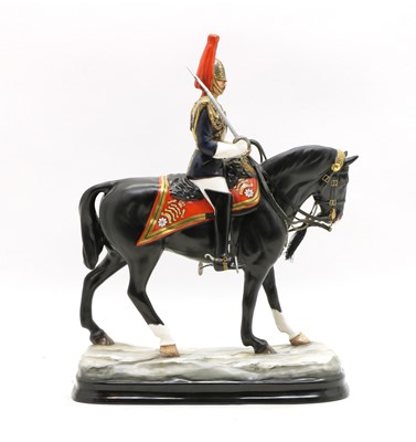 Lot 109 - A Michael Sutty porcelain figure on horseback