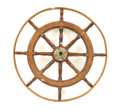 Lot 515 - A large teak ships wheel