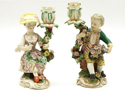 Lot 77 - A pair of Meissen style candlesticks