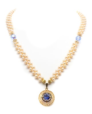 Lot 256 - A gold synthetic sapphire and cultured freshwater pearl necklace