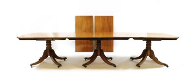 Lot 496 - A Regency mahogany triple pillar dining table