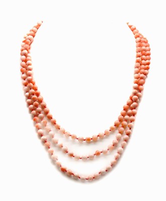 Lot 143 - A three row coral bead necklace