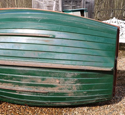 Lot 496 - A fibreglass rowing boat