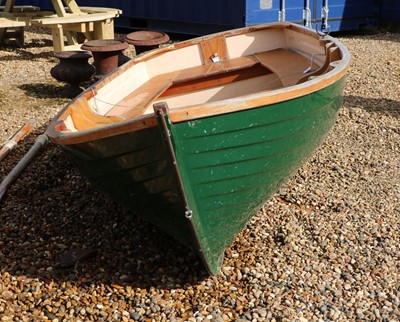 Lot 496 - A fibreglass rowing boat