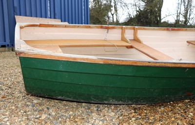 Lot 496 - A fibreglass rowing boat