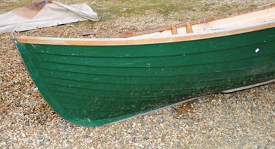 Lot 496 - A fibreglass rowing boat