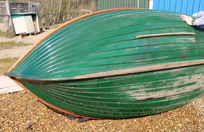 Lot 496 - A fibreglass rowing boat