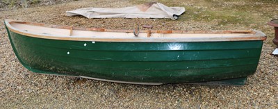 Lot 496 - A fibreglass rowing boat