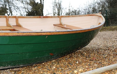 Lot 496 - A fibreglass rowing boat