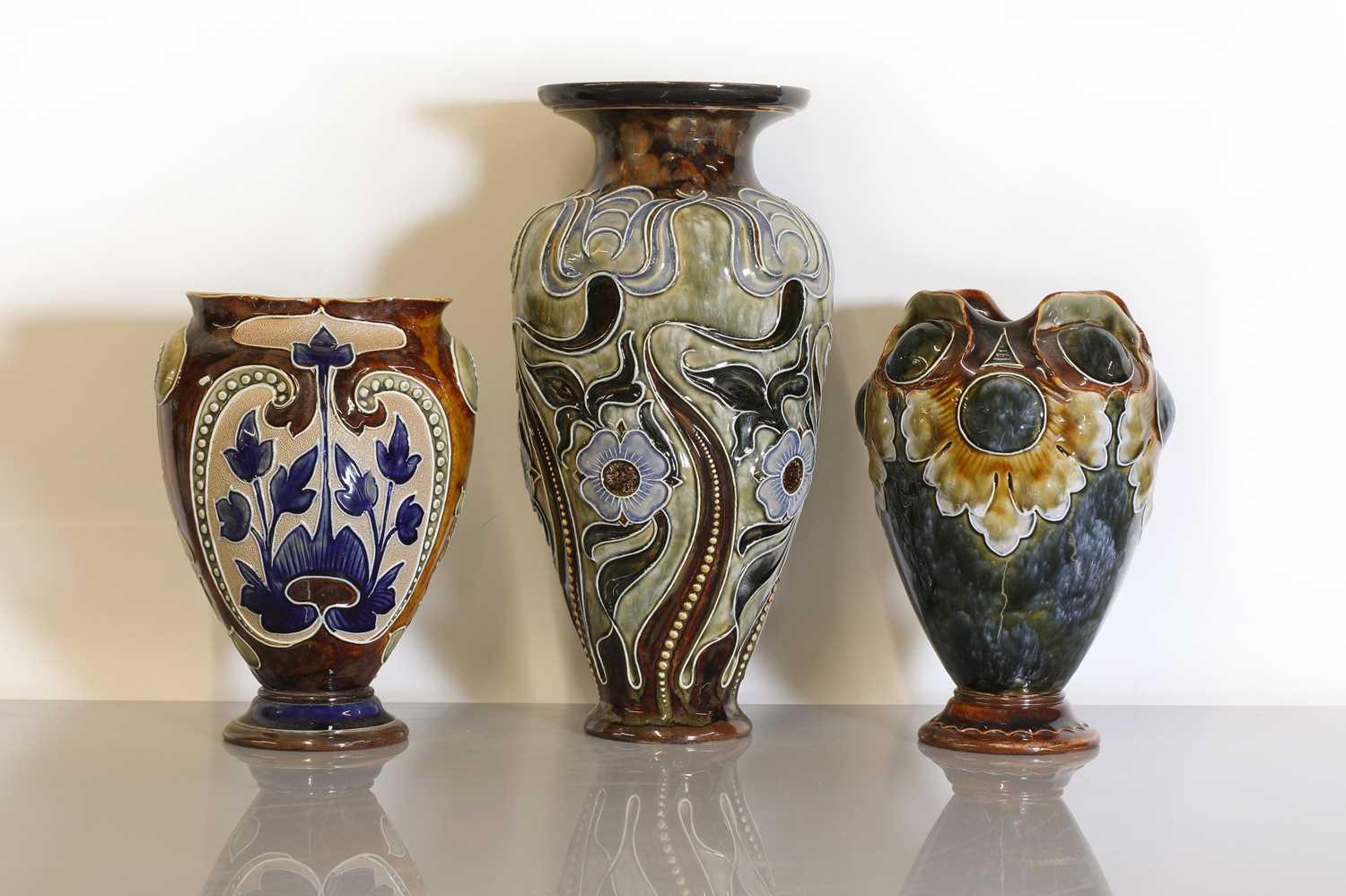 Lot 79 - Three Doulton Lambeth stoneware vases