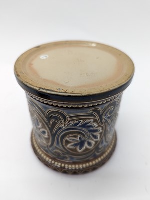 Lot 41 - A Doulton Lambeth stoneware tobacco jar and two pots
