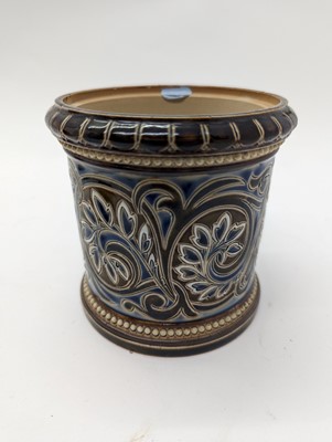 Lot 41 - A Doulton Lambeth stoneware tobacco jar and two pots