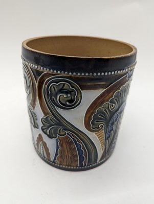 Lot 41 - A Doulton Lambeth stoneware tobacco jar and two pots