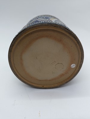 Lot 41 - A Doulton Lambeth stoneware tobacco jar and two pots