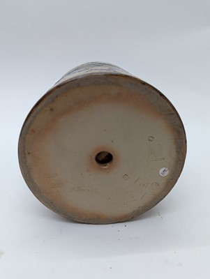 Lot 41 - A Doulton Lambeth stoneware tobacco jar and two pots