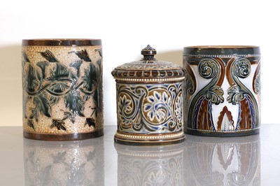 Lot 41 - A Doulton Lambeth stoneware tobacco jar and two pots