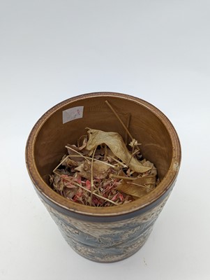 Lot 41 - A Doulton Lambeth stoneware tobacco jar and two pots