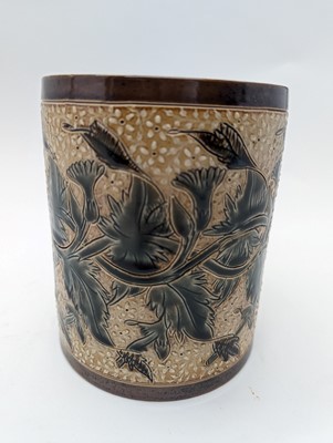 Lot 41 - A Doulton Lambeth stoneware tobacco jar and two pots
