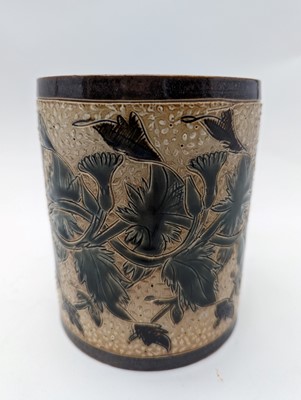 Lot 41 - A Doulton Lambeth stoneware tobacco jar and two pots
