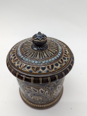 Lot 41 - A Doulton Lambeth stoneware tobacco jar and two pots