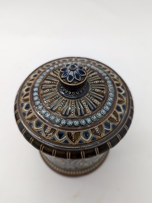 Lot 41 - A Doulton Lambeth stoneware tobacco jar and two pots