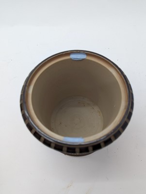 Lot 41 - A Doulton Lambeth stoneware tobacco jar and two pots