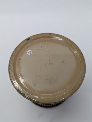 Lot 41 - A Doulton Lambeth stoneware tobacco jar and two pots
