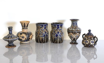 Lot 42 - A pair of Doulton Lambeth stoneware vases, three vases and a sucrier and cover