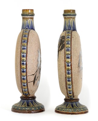 Lot 42 - A pair of Doulton Lambeth stoneware moon flasks