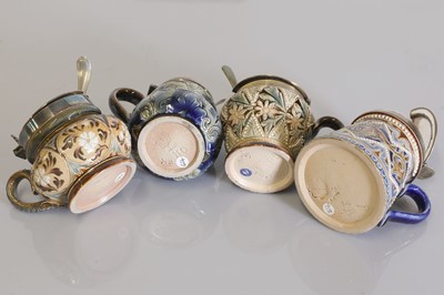 Lot 47 - A cased set of four Doulton Lambeth stoneware cruets