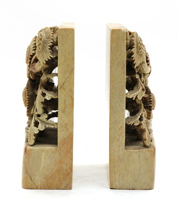 Lot 180 - A pair of soapstone bookend