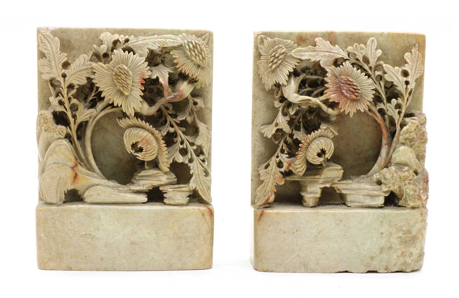 Lot 180 - A pair of soapstone bookend