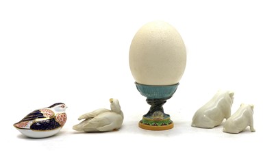 Lot 78 - An Ostridge egg on majolica stand