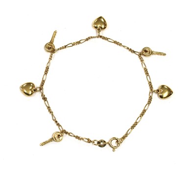 Lot 168 - A 9ct gold charm bracelet