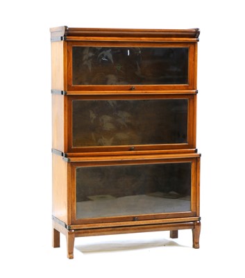 Lot 508 - A walnut Globe Wernick modular bookcase