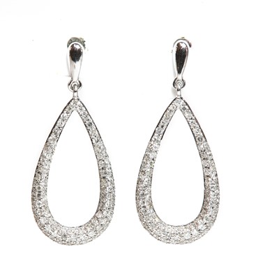 Lot 95 - A pair of 14ct white gold diamond set drop earrings