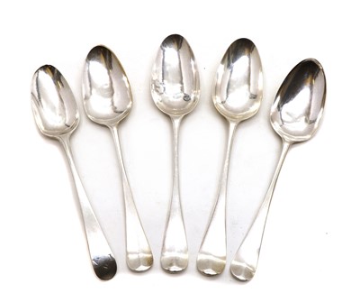 Lot 7 - A collection of four George III and later silver shell back pattern spoons