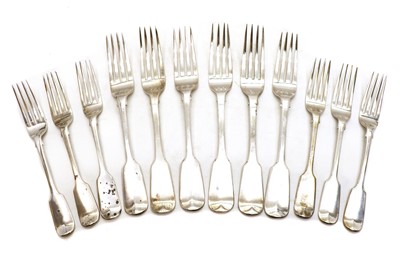Lot 6 - A collection of seven Victorian Fiddle pattern silver dessert forks