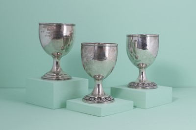 Lot 311 - Three Georgian silver presentation stock trophies