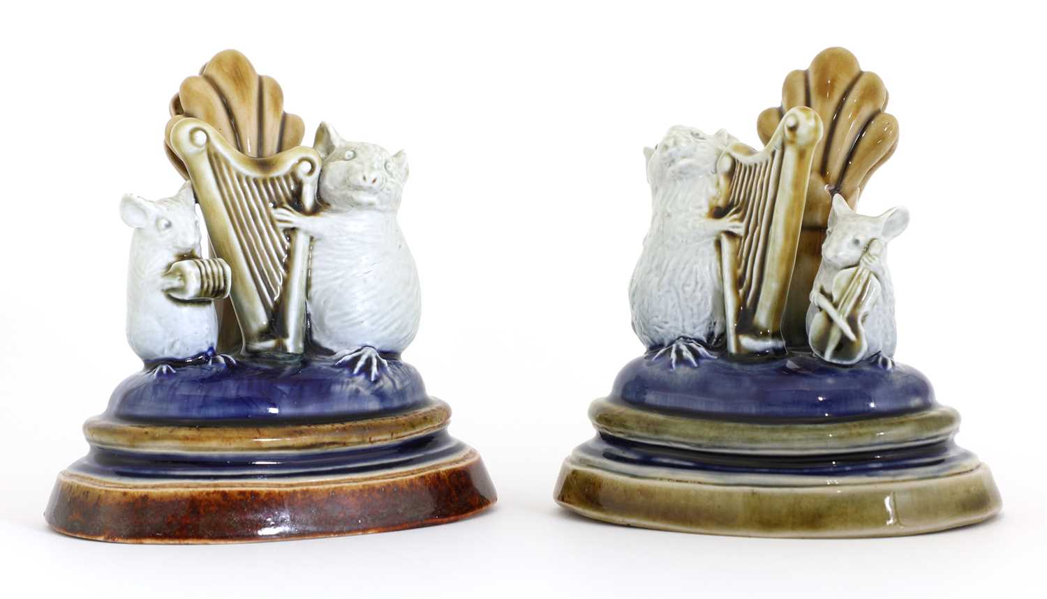 Lot 62 - Two Doulton stoneware 'Mouse Musician' menu holders