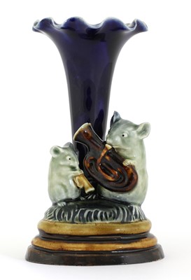 Lot 66 - A Doulton stoneware 'Mouse Musicians' spill vase