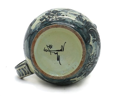 Lot 222 - A Delft jug